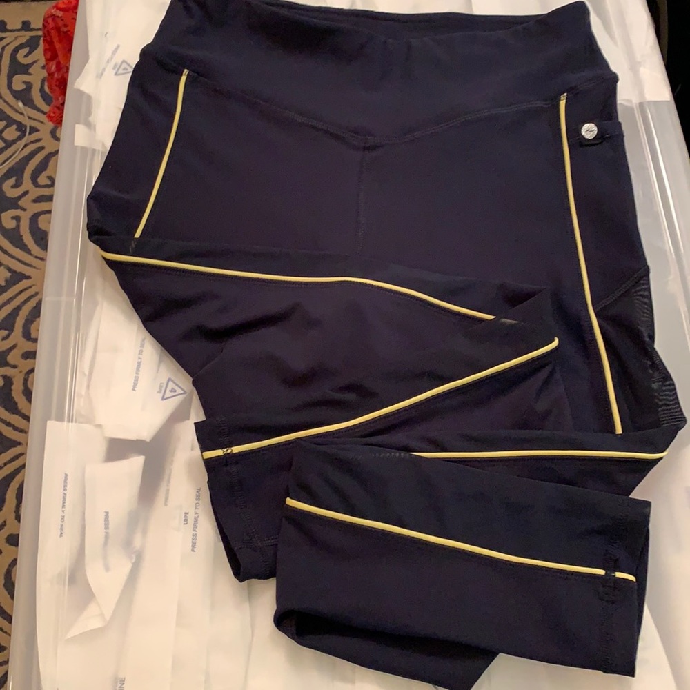 Navy and yellow yoga pants with mesh stripes
